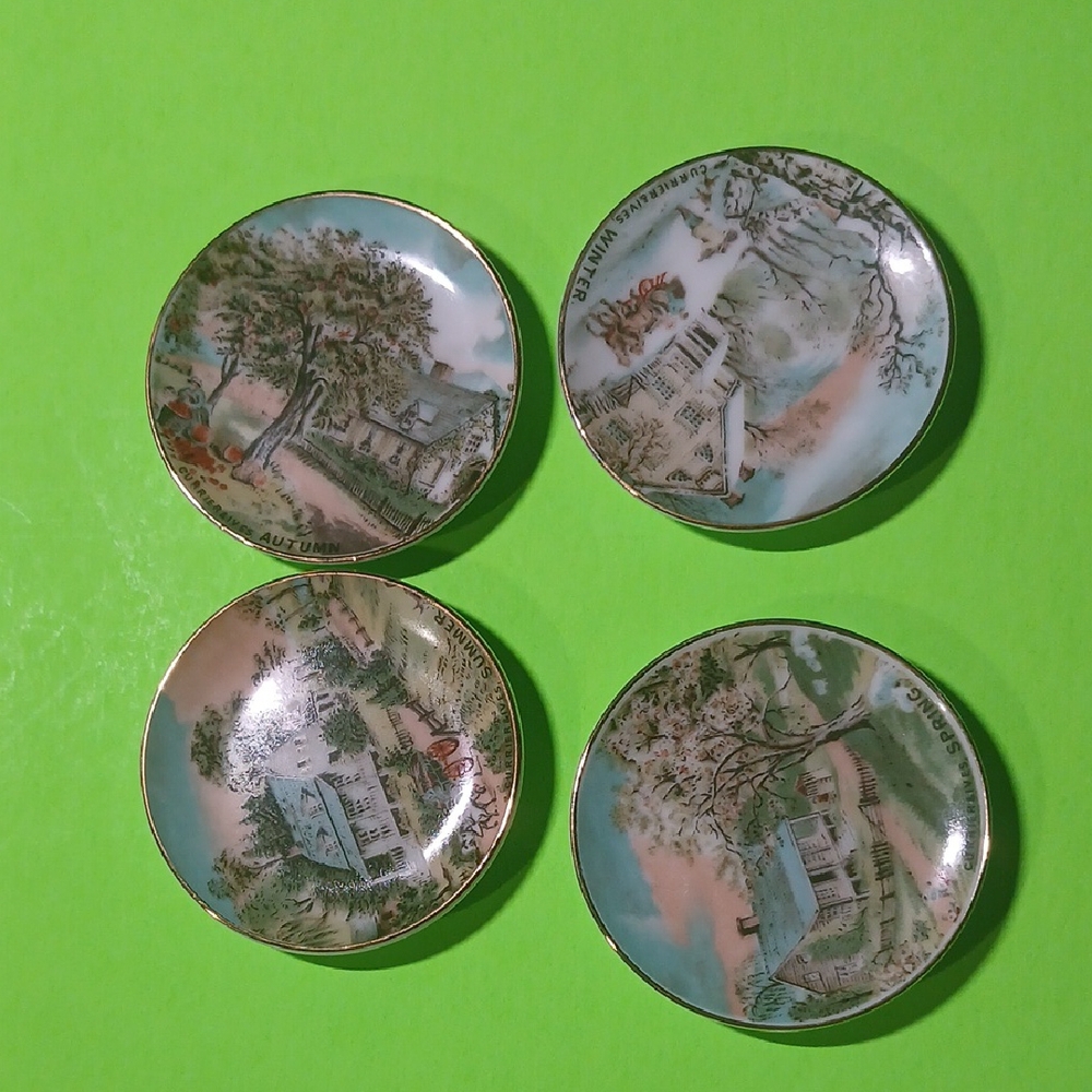 Set of Four Seasonal Decorative Plates